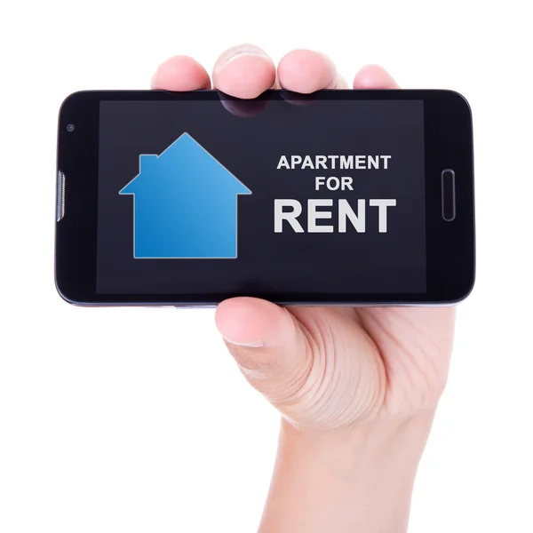 a hand holdind a phone with a real estate app
